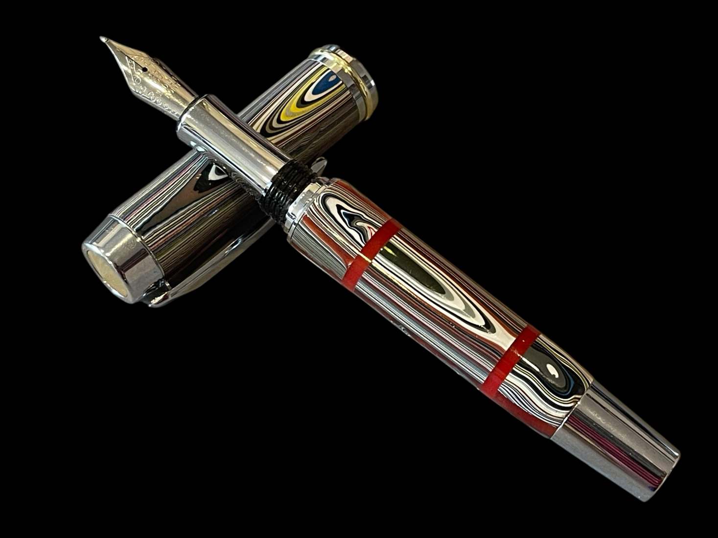 Fordite Fountain Pen with Red Acrylic Accents - Image 6
