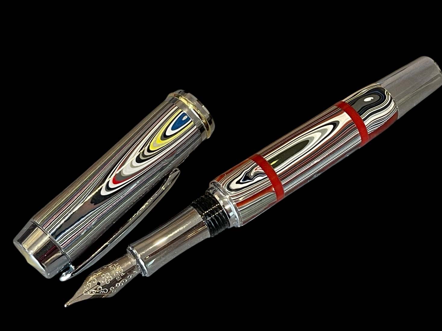 Fordite Fountain Pen with Red Acrylic Accents - Image 7