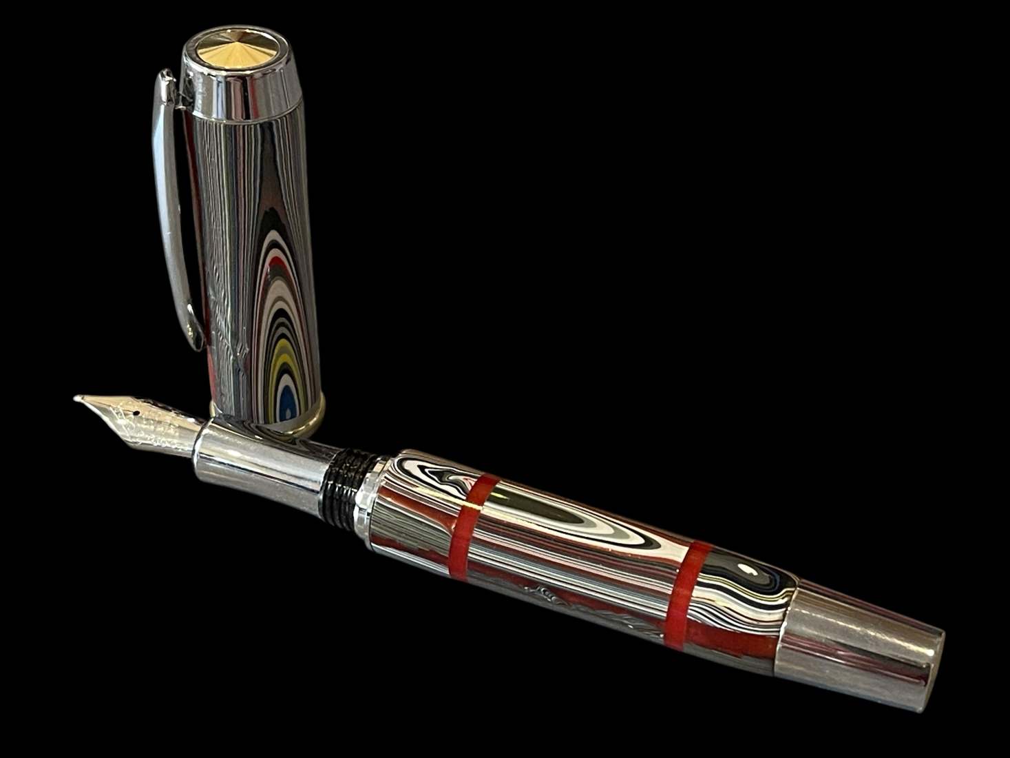 Fordite Fountain Pen with Red Acrylic Accents - Image 5